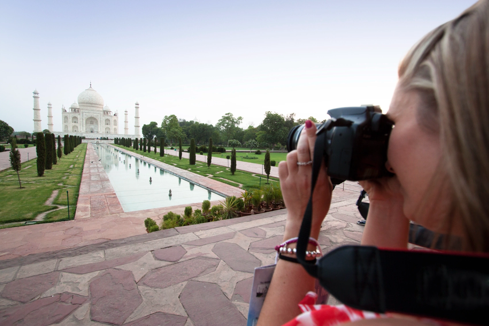 Taj Mahal, India A traveller takes of photo of the Taj Mahal in Agra, India