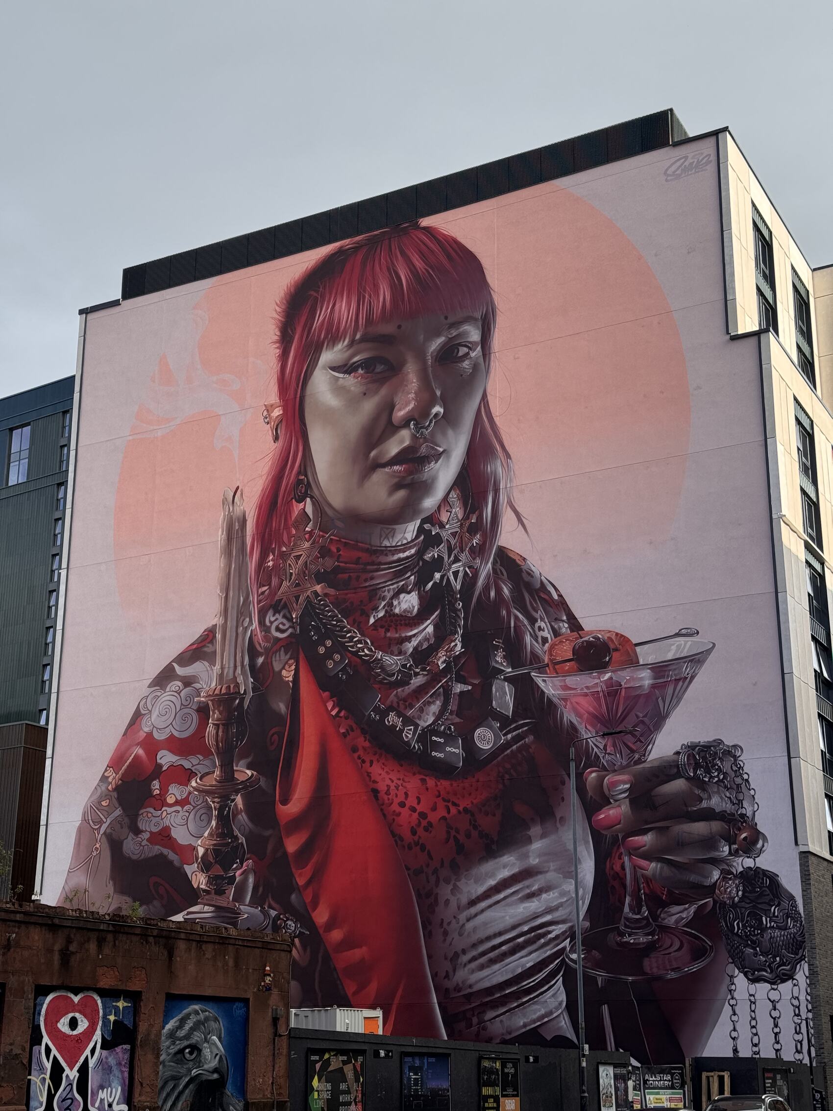 Colourful street art on the side of a building in Glasgow, Scotland