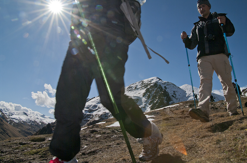 sunflare through the boots of a trekker.