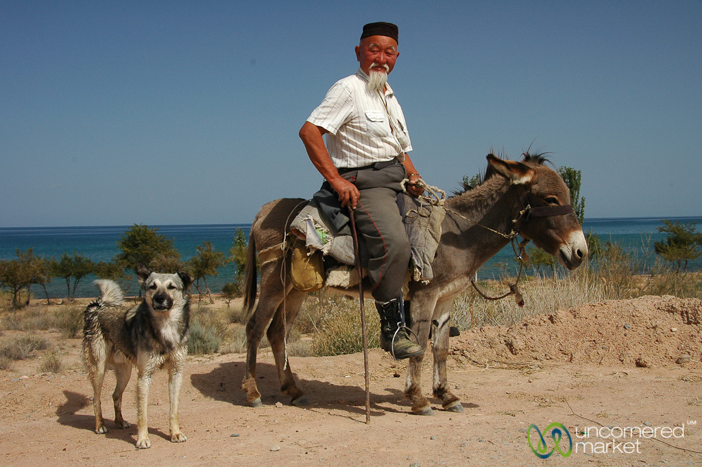 A friendly shepherd on the shores of Lake Issyk-Kul, Kyrgyzstan.