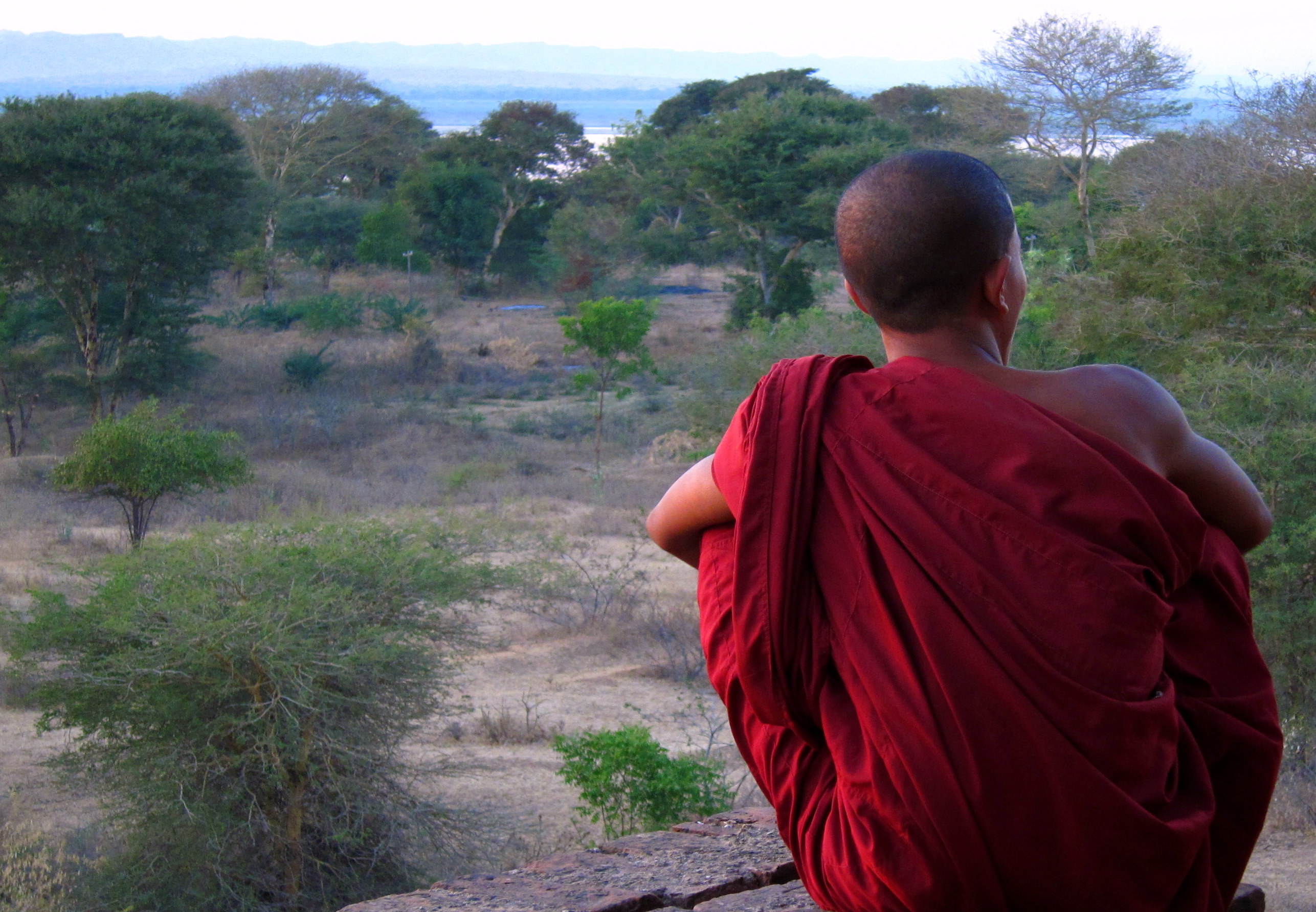 <p>Lone monk watching the sunset.</p> Lone monk watching the sunset.