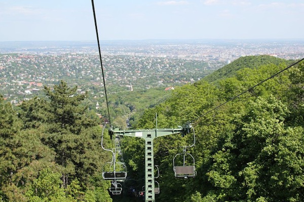 <p>Riding on the chairlift through the Buda Hills.</p> Riding on the chairlift through the Buda Hills.