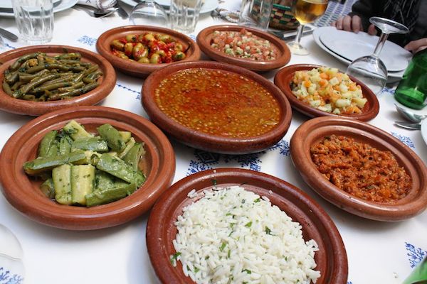 An assortment of Moroccan dishes cooked in the tagine