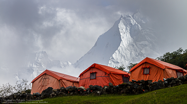 <p>Tent Camp In Front Of Cloud Shrouded Thamserku And Kangtega, Nepal.</p> Tent Camp In Front Of Cloud Shrouded Thamserku And Kangtega, Nepal.