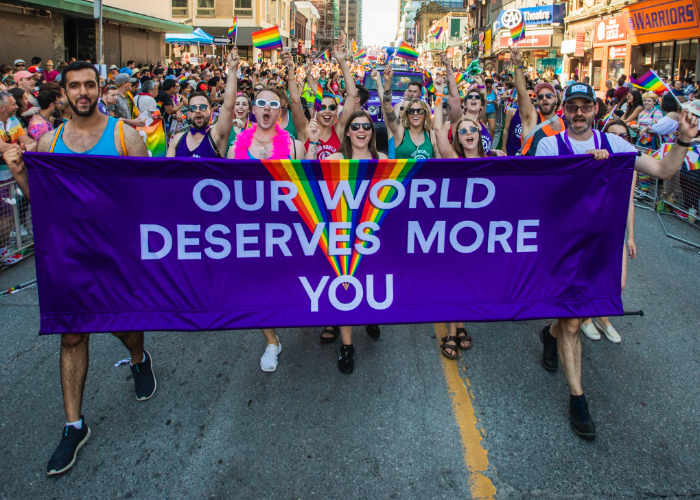 flying our banner high at a past Pride Parade