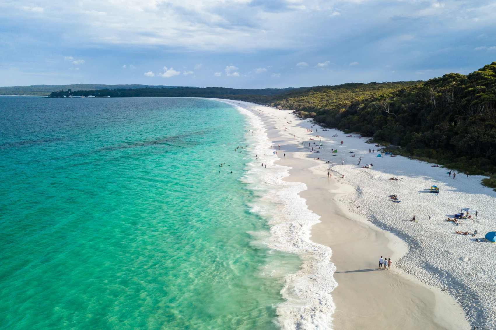 Elevated view of people walking along Hyams Beach, Australia