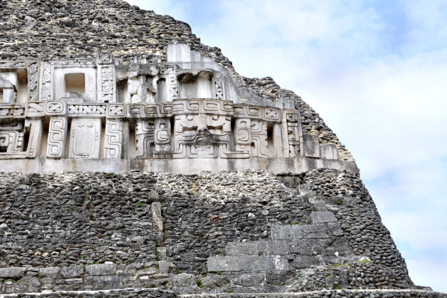 Carvings on the ancient structure of Xunantunich in Belize