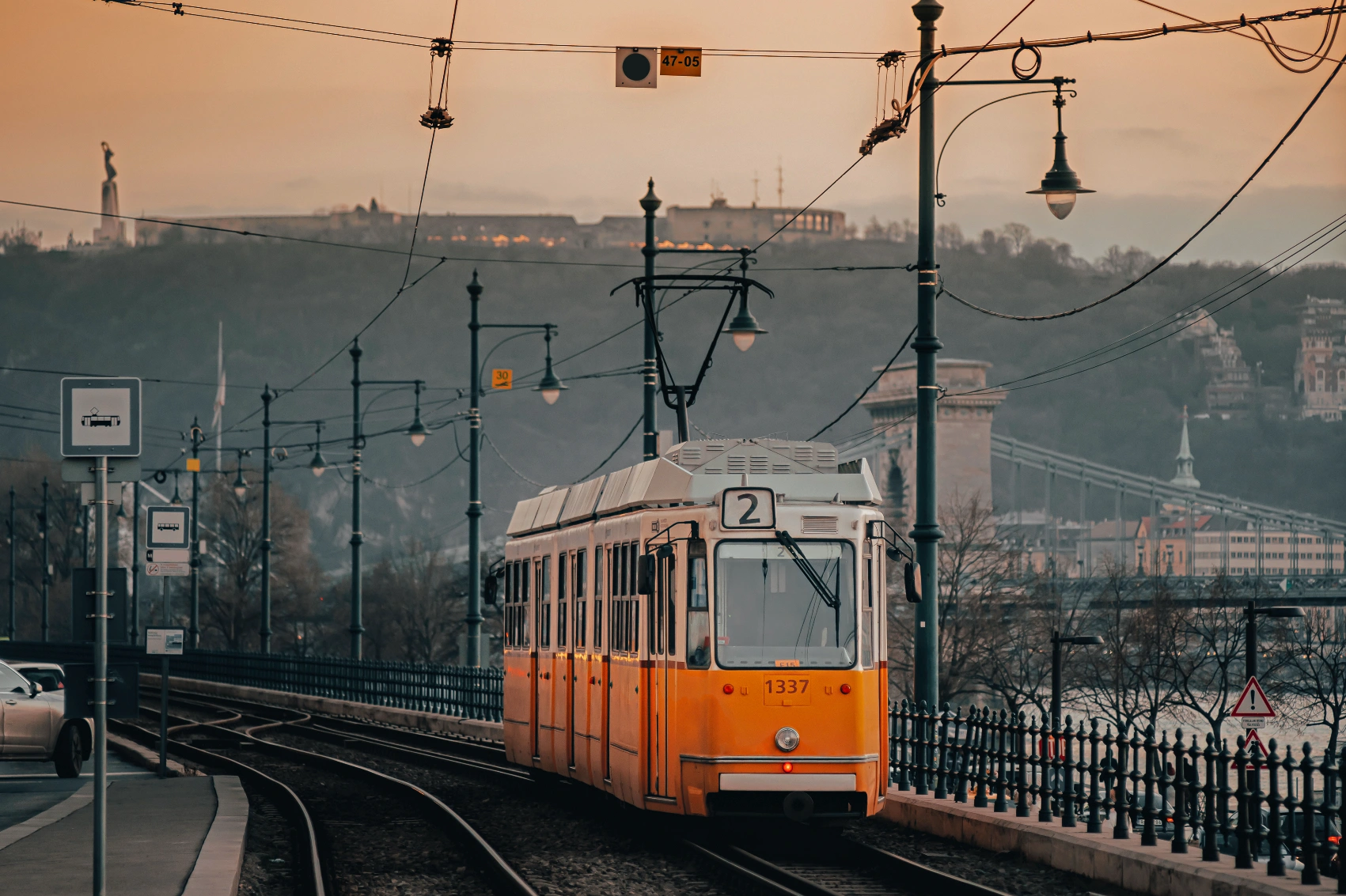 Tram 2 travels across a bridge in Budapest, Hungary
