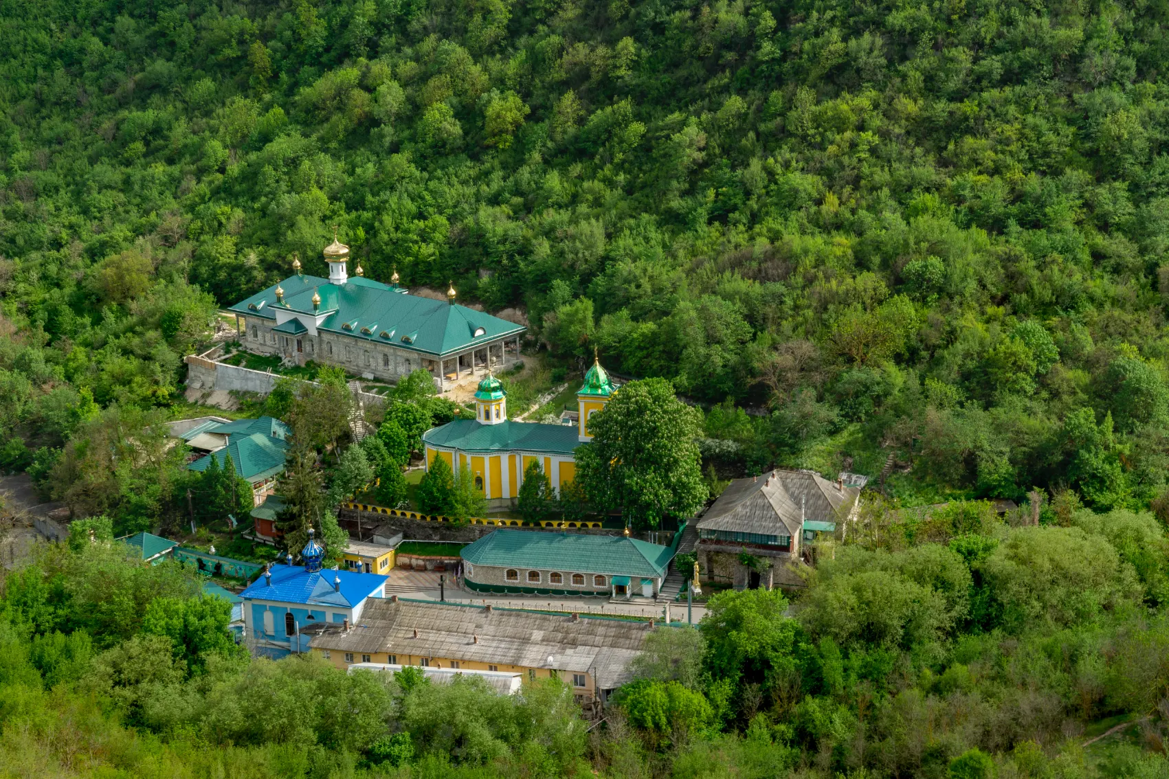 The iconic witches hat toppers stand out against blue skies at Soroca Fortress in Moldova