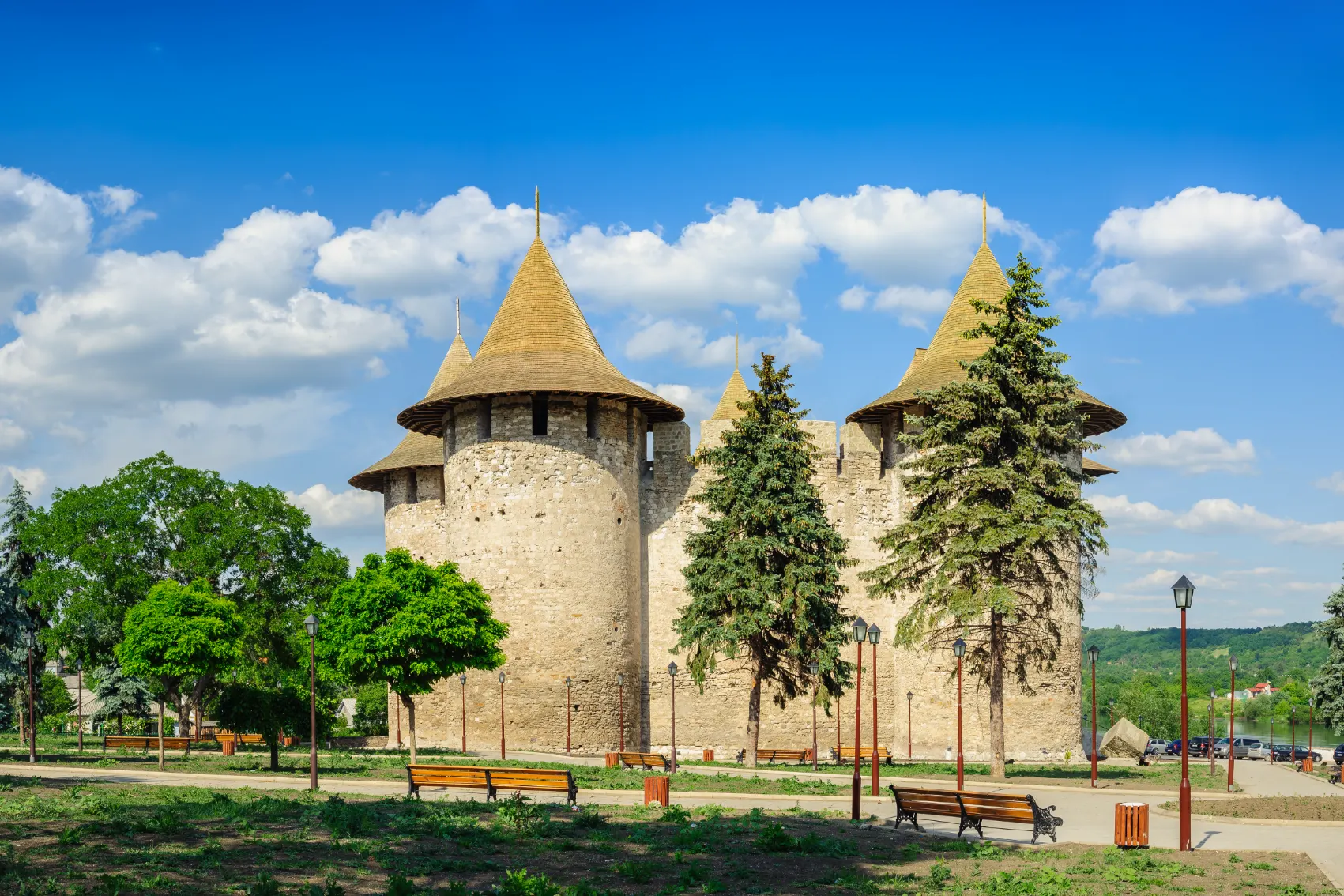 The iconic witches hat toppers stand out against blue skies at Soroca Fortress in Moldova