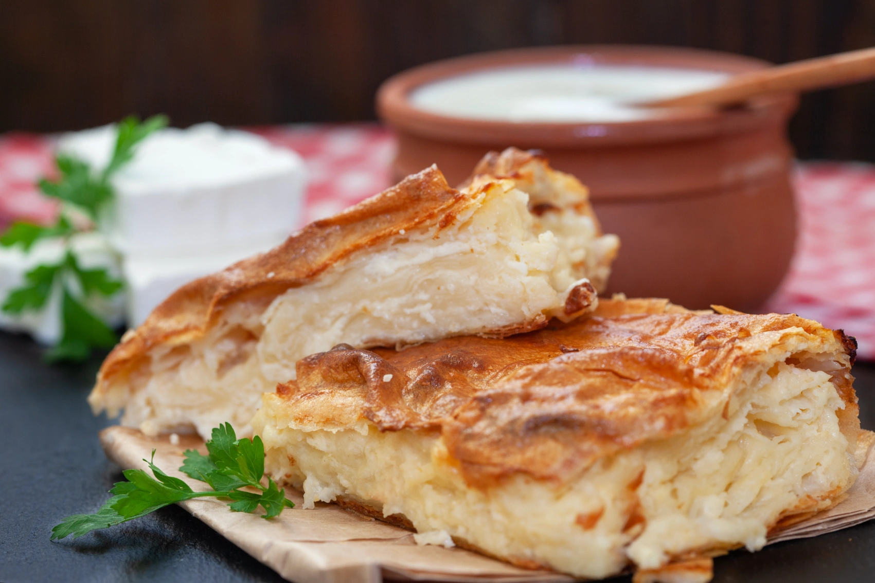 A plate of cut slices of Serbian gibanica