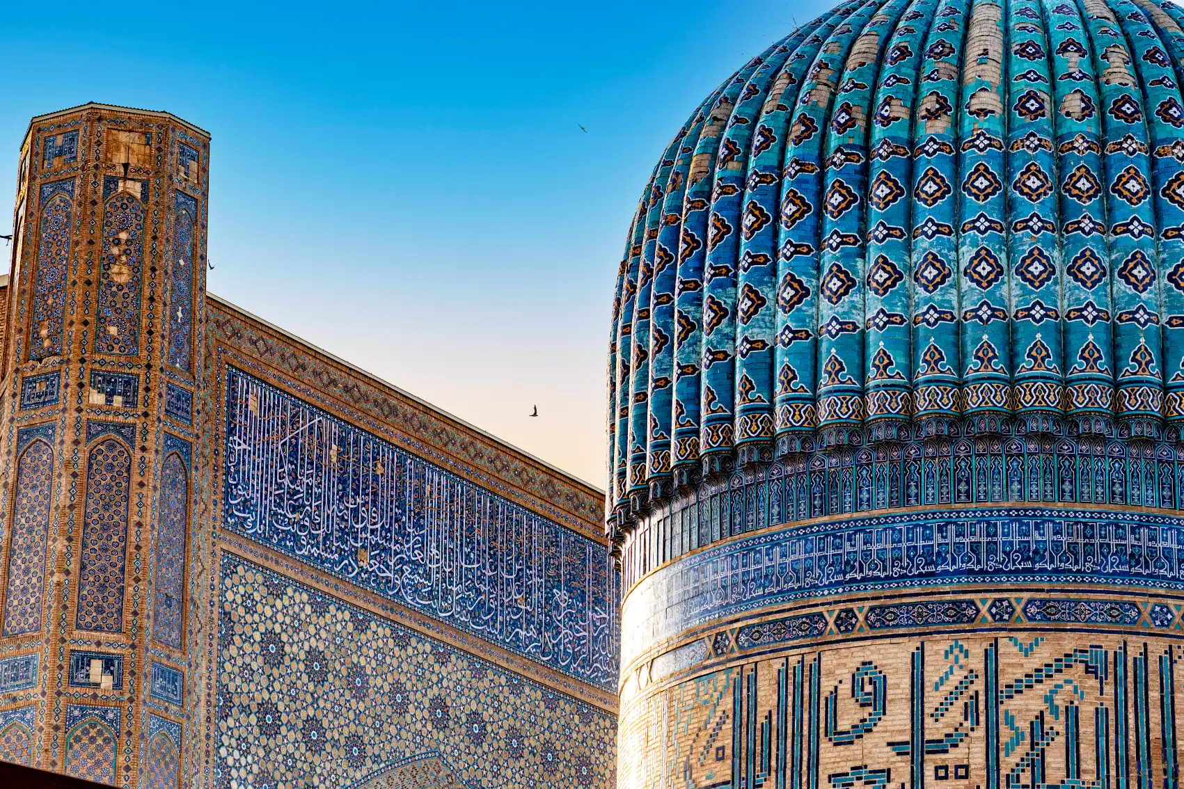 Ornate tilework on the exterior of the Amir Timur Mausoleum in Samarkand, Uzbekistan