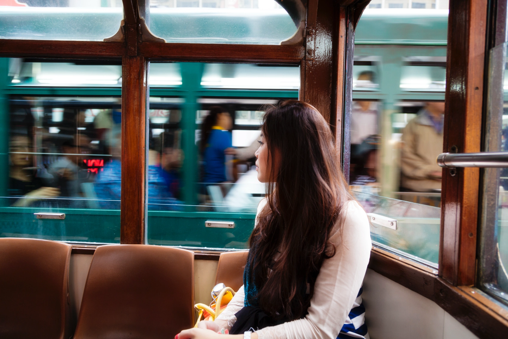 Tram, Hong Kong A woman rides a tram in Hong Kong