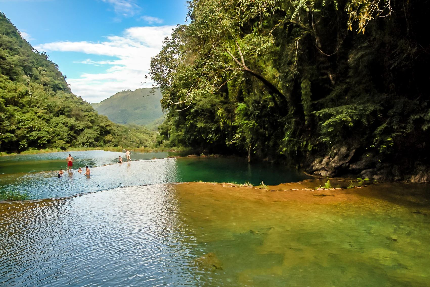 Semuc Champey, Guatemala People swim in the natural pools of Semuc Champey in Guatemala