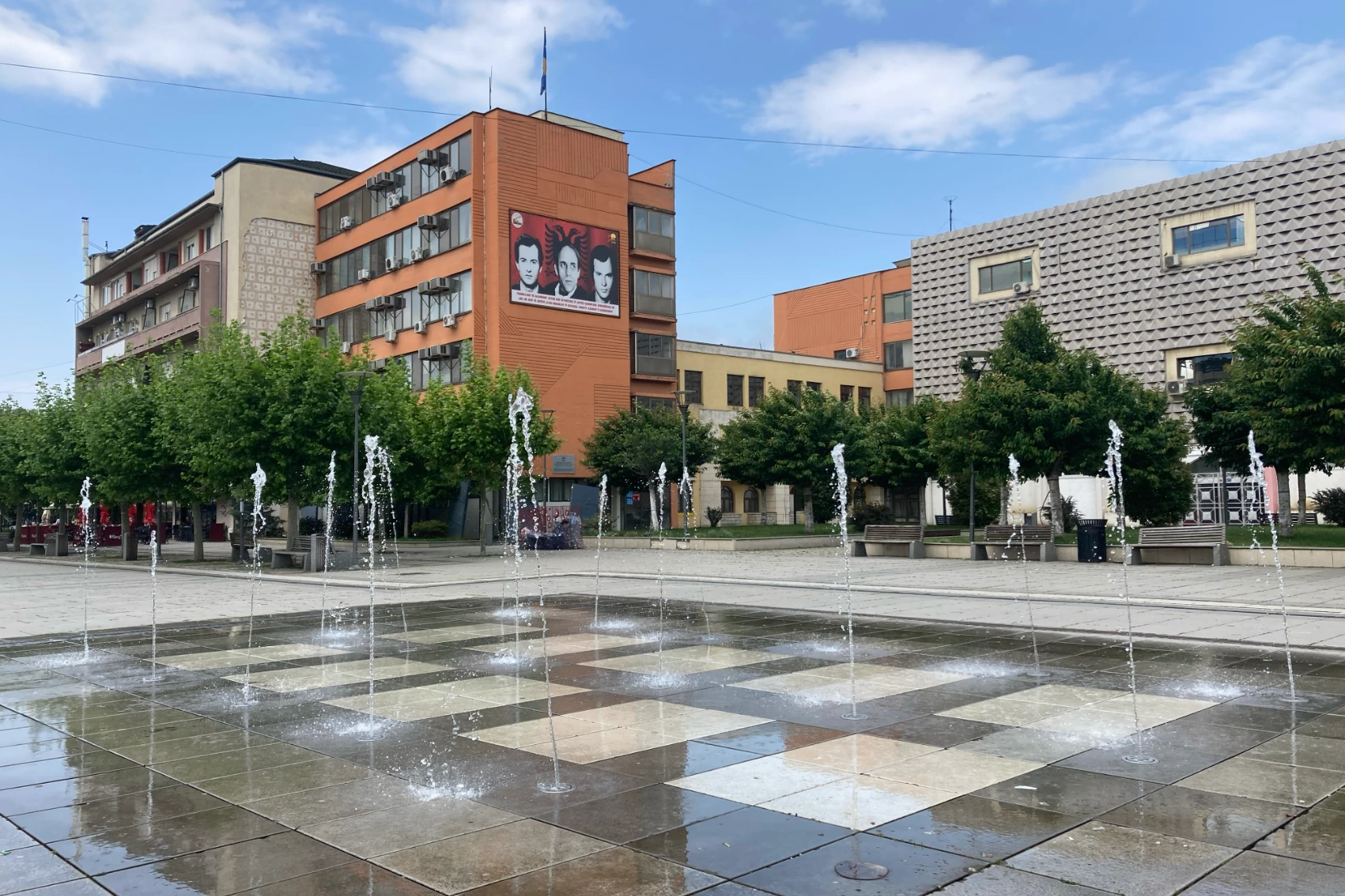 Fountains in Skanderbeg Square on a sunny day in Pristina