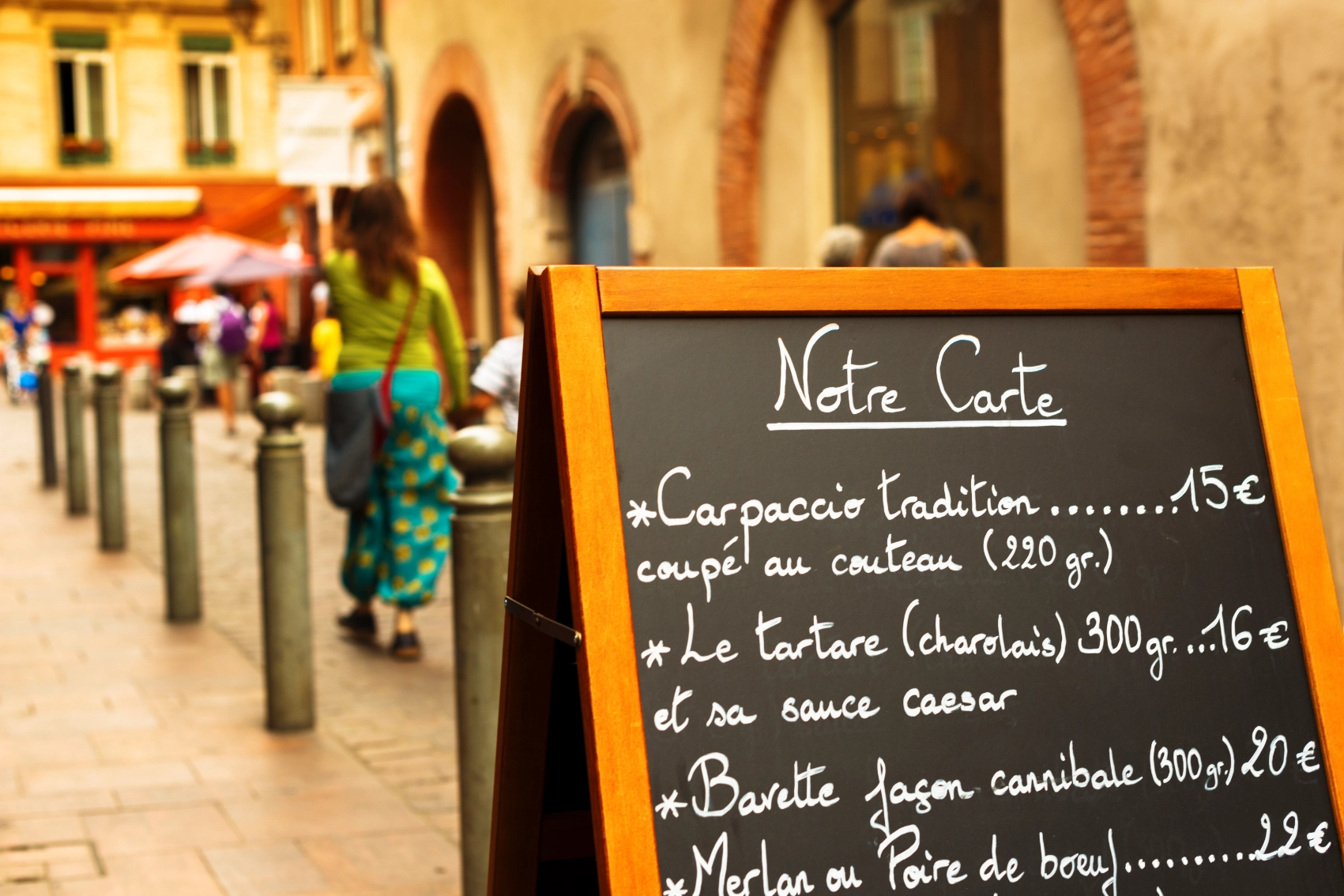 Lyon, France A menu written on a chalkboard outside of a restaurant in Lyon, France
