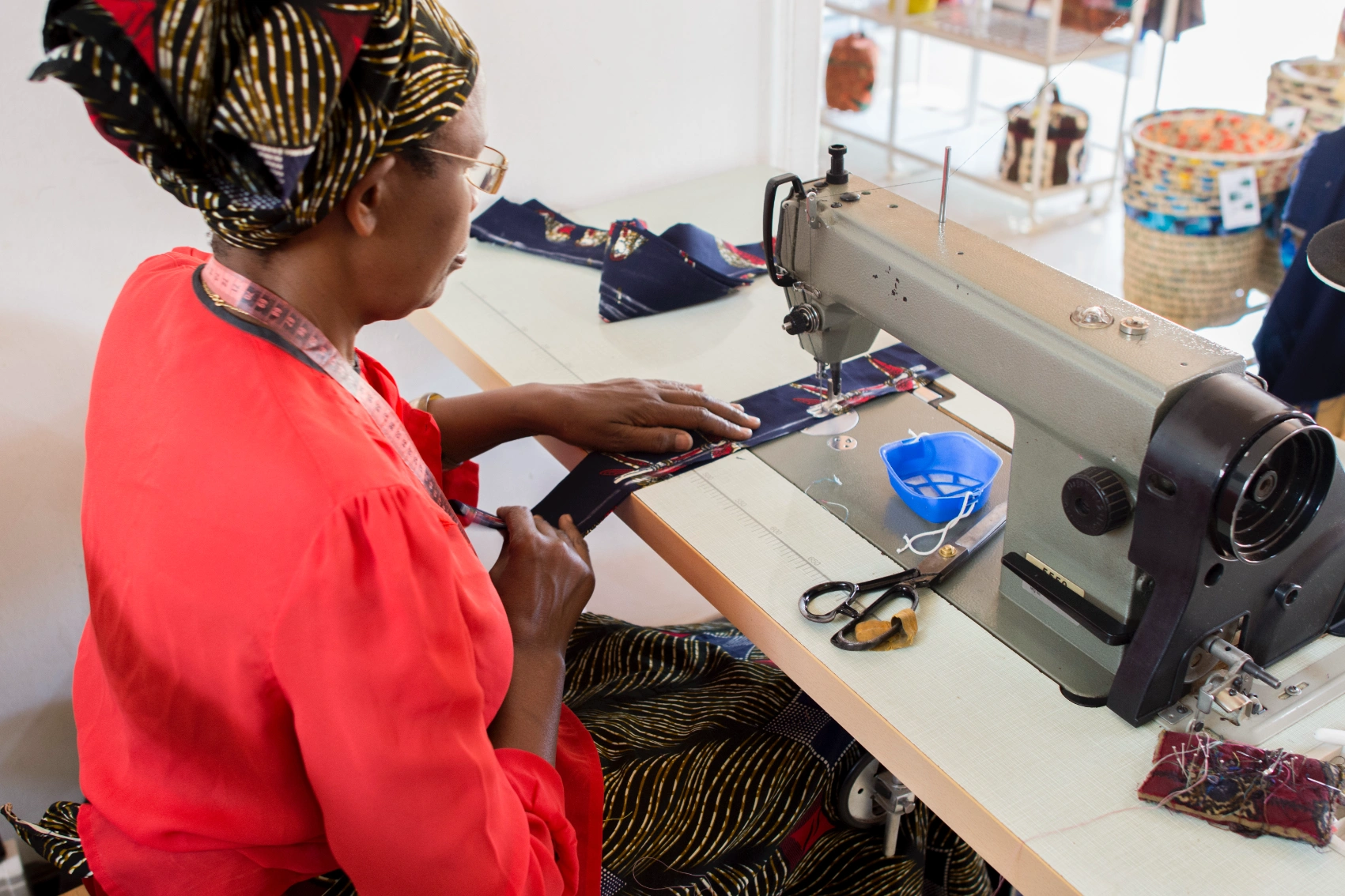 Nyamirambo Women’s Center, Rwanda A woman at Nyamirambo Women’s Center in Rwanda works at a sewing machine