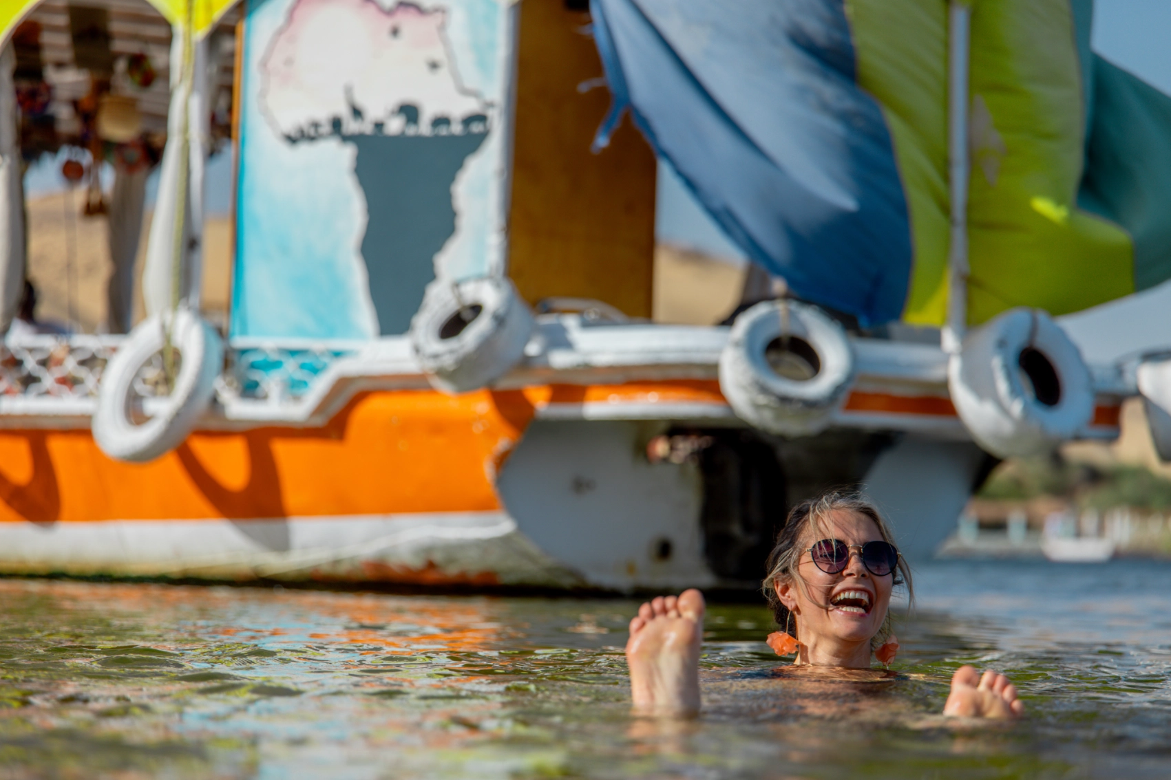 A traveller swims in the Nile near Aswan, Egypt