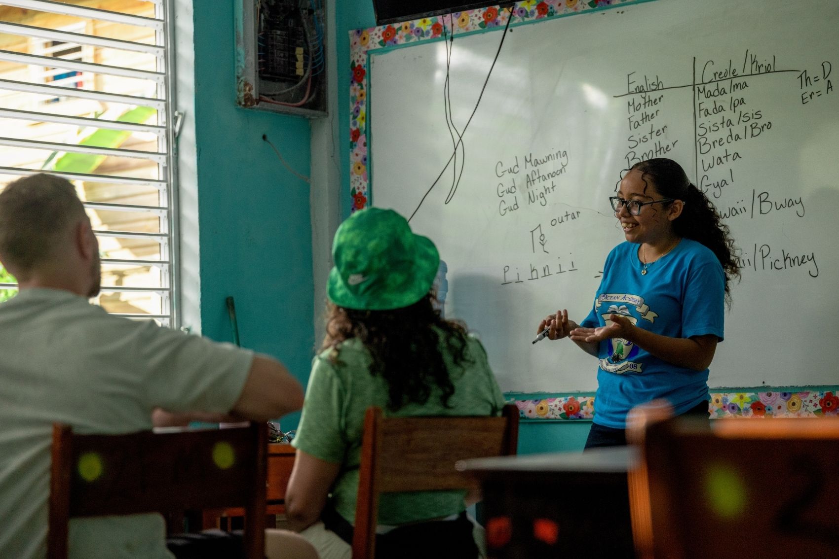 A picture of a Teacher teaching at the Ocean Academy in Caye Caulker, Belize