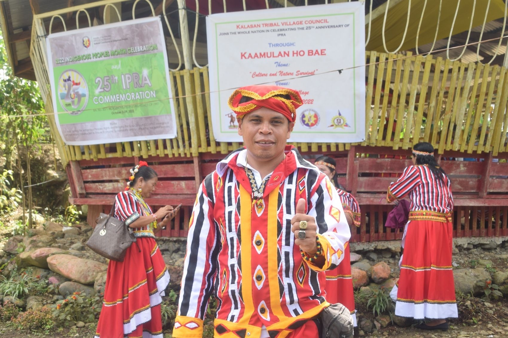 A member of the local Tribes and Nature Defenders posing for a photograph in the Philippines