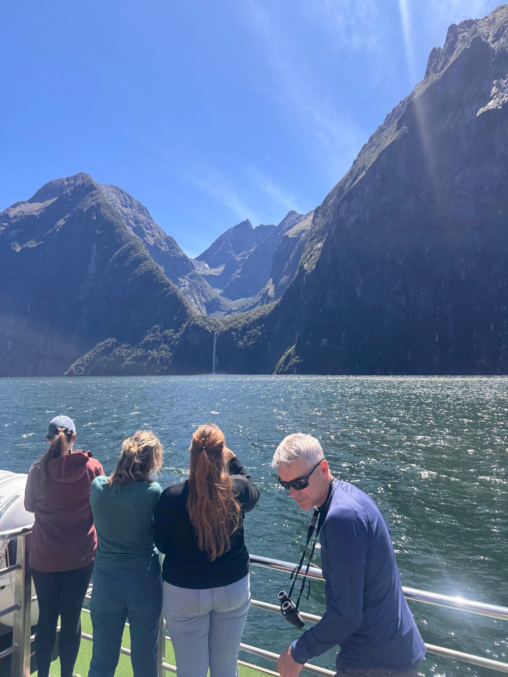 A group of travellers gazing at the view in New Zealand&rsquo;s South Island