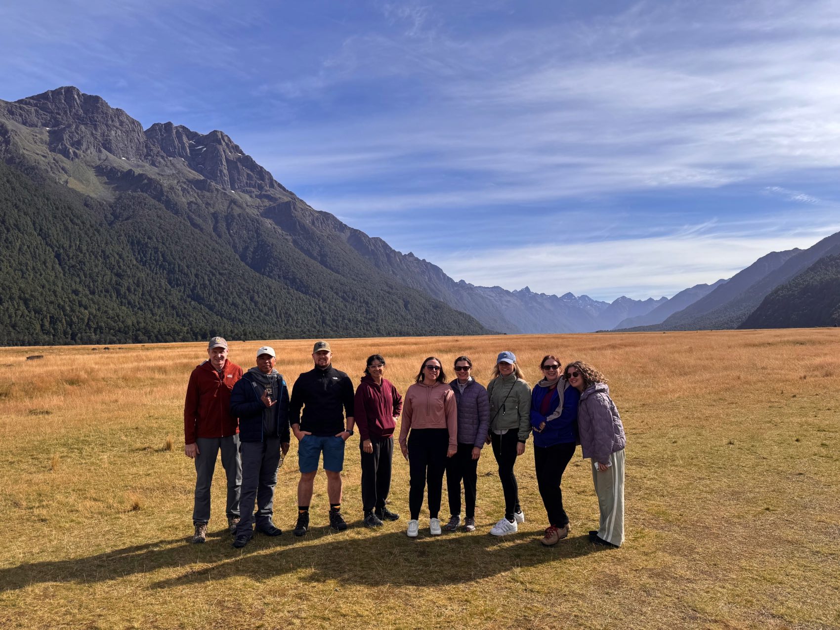 A group of travellers posing for a photograph in New Zealand&rsquo;s South Island