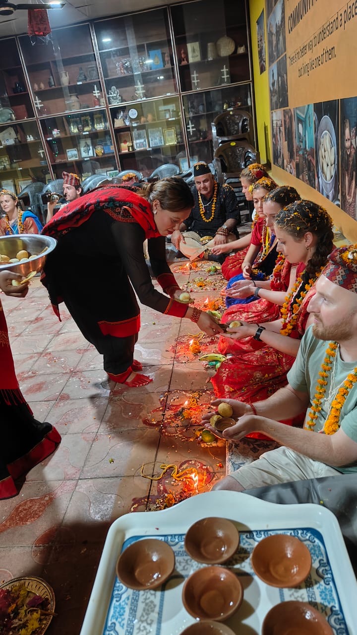 The women of Panauti homestay serving travellers food and drink