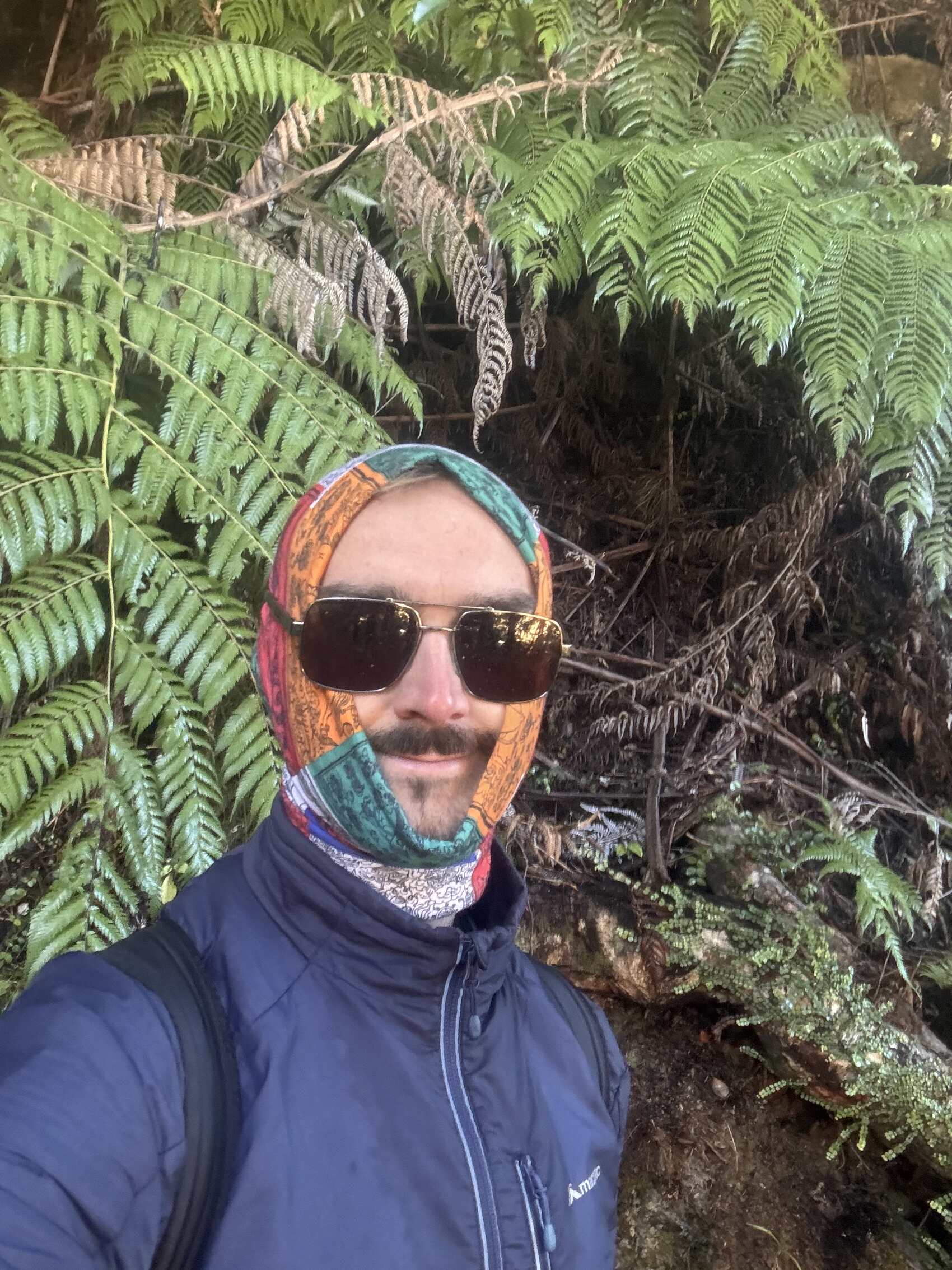 CEO Tom Leonard wearing a scarf/buff to escape the elements in New Zealand