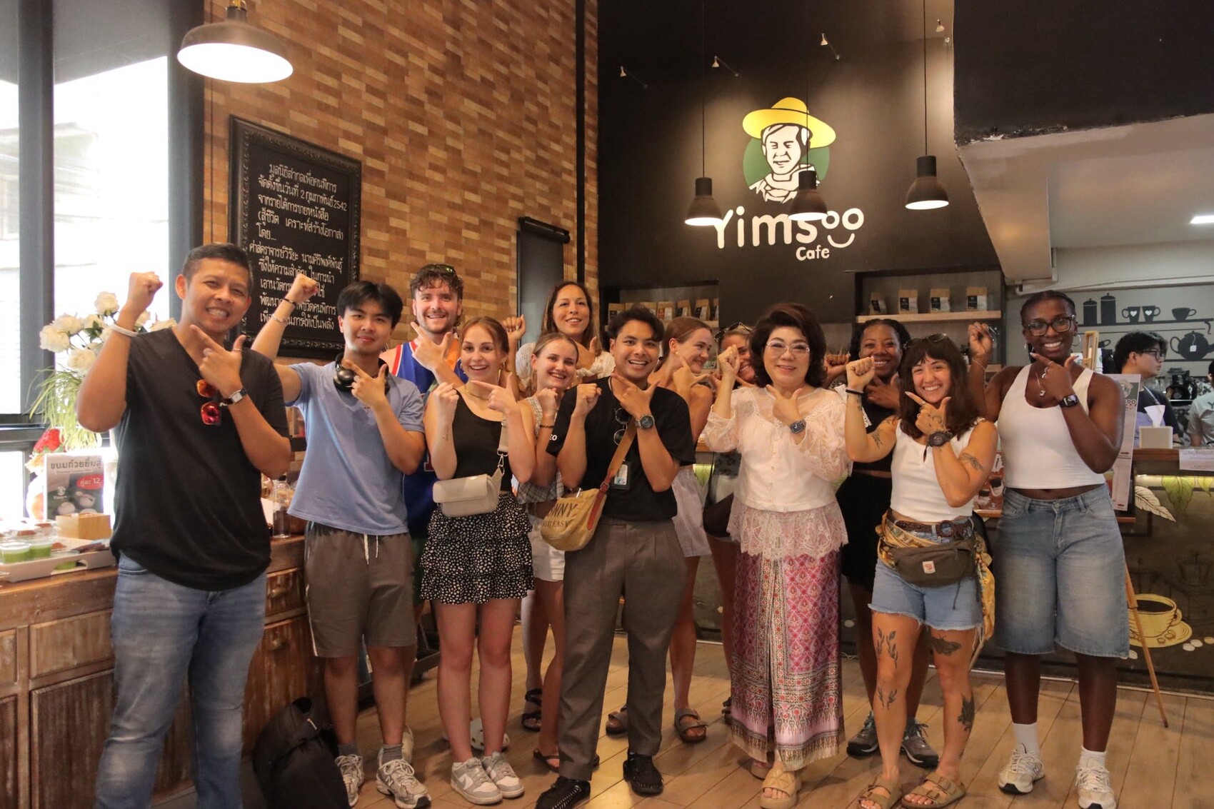The team members of the Yimsoo Cafe in Bangkok for Planeterra