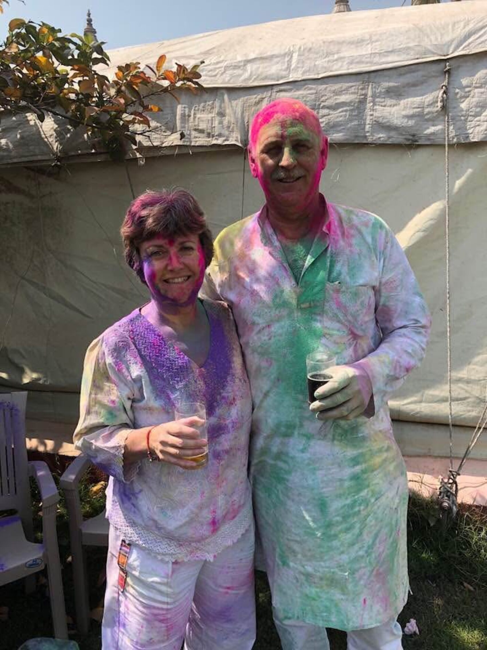 Judy and Blair a couple from Manitoba, Canada posing for a photograph at Holi Festival in India