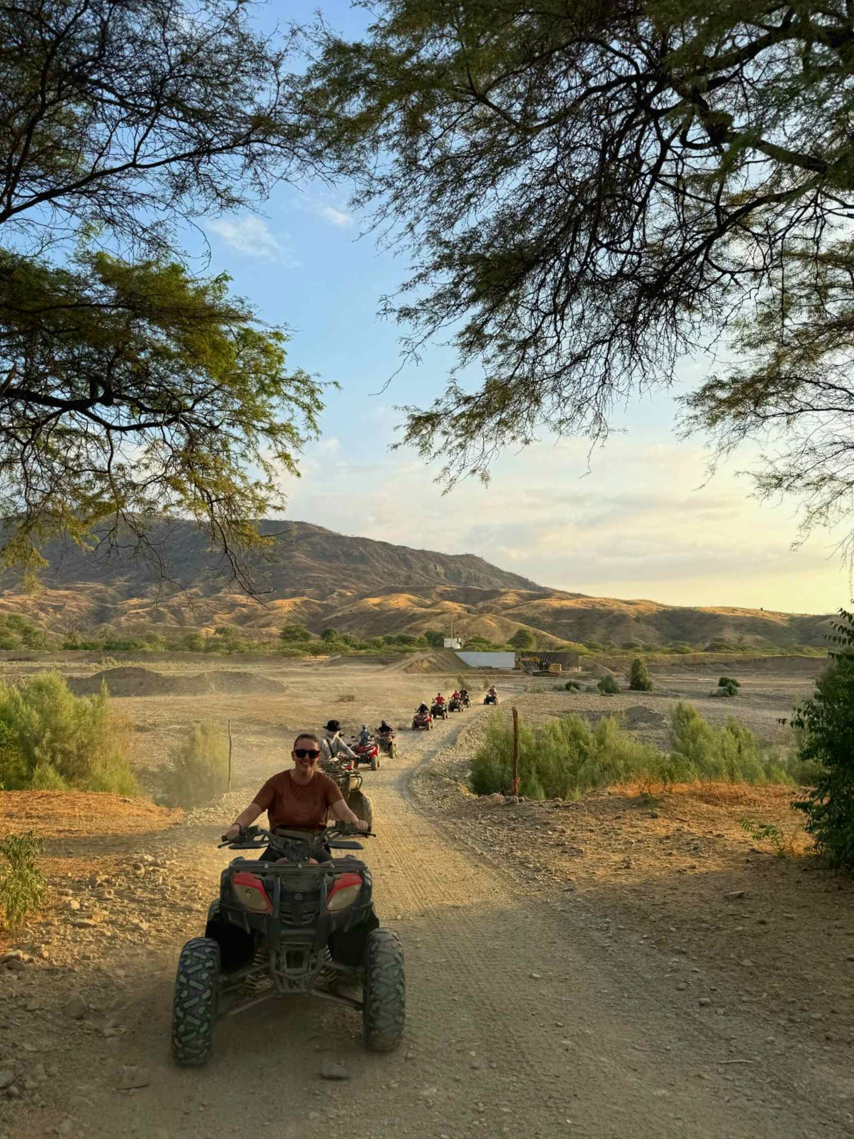 A group of travellers quad biking in Peru
