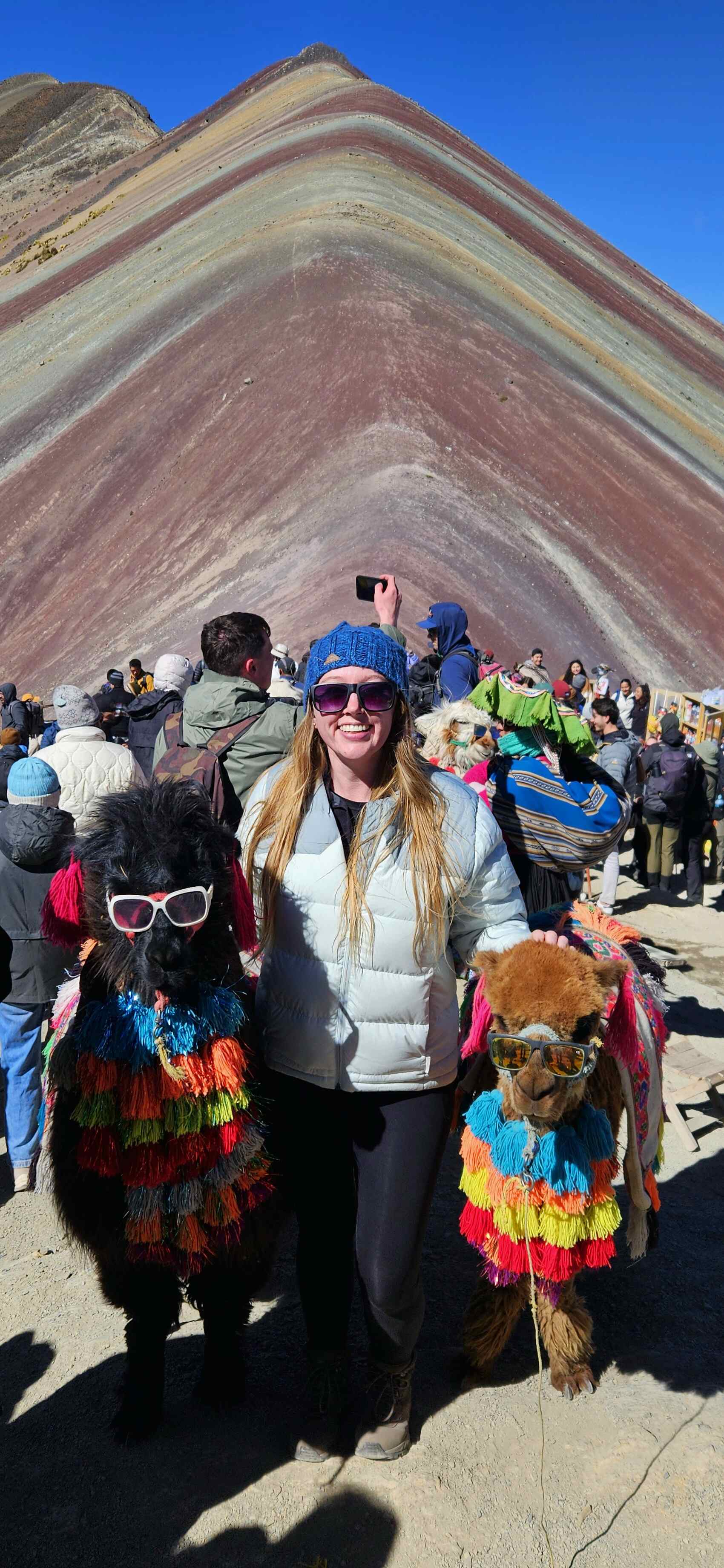 Traveller Milly from New Zealand posing for a picture at Rainbow Mountain
