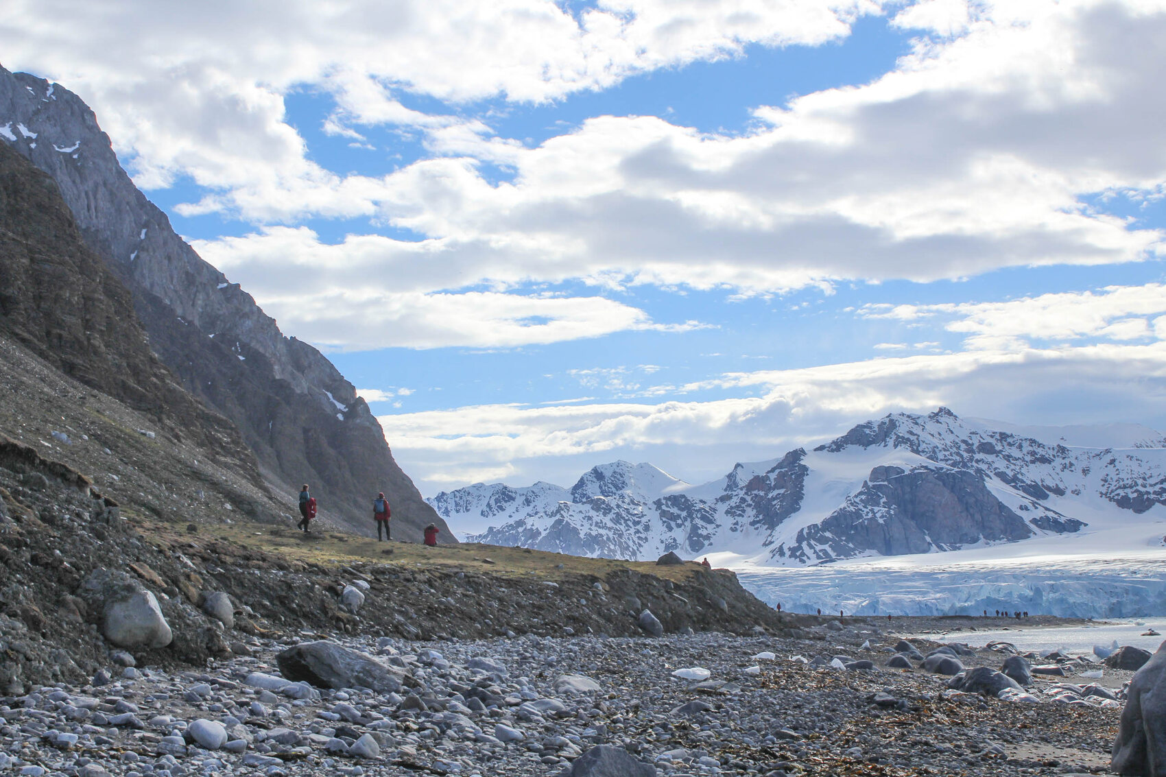 Travellers admiring the view of the mountains at the South Shetland Island