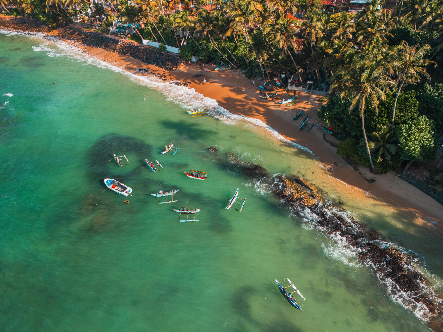 An aerial view of fishing boats by the Indian Ocean in Sri Lanka
