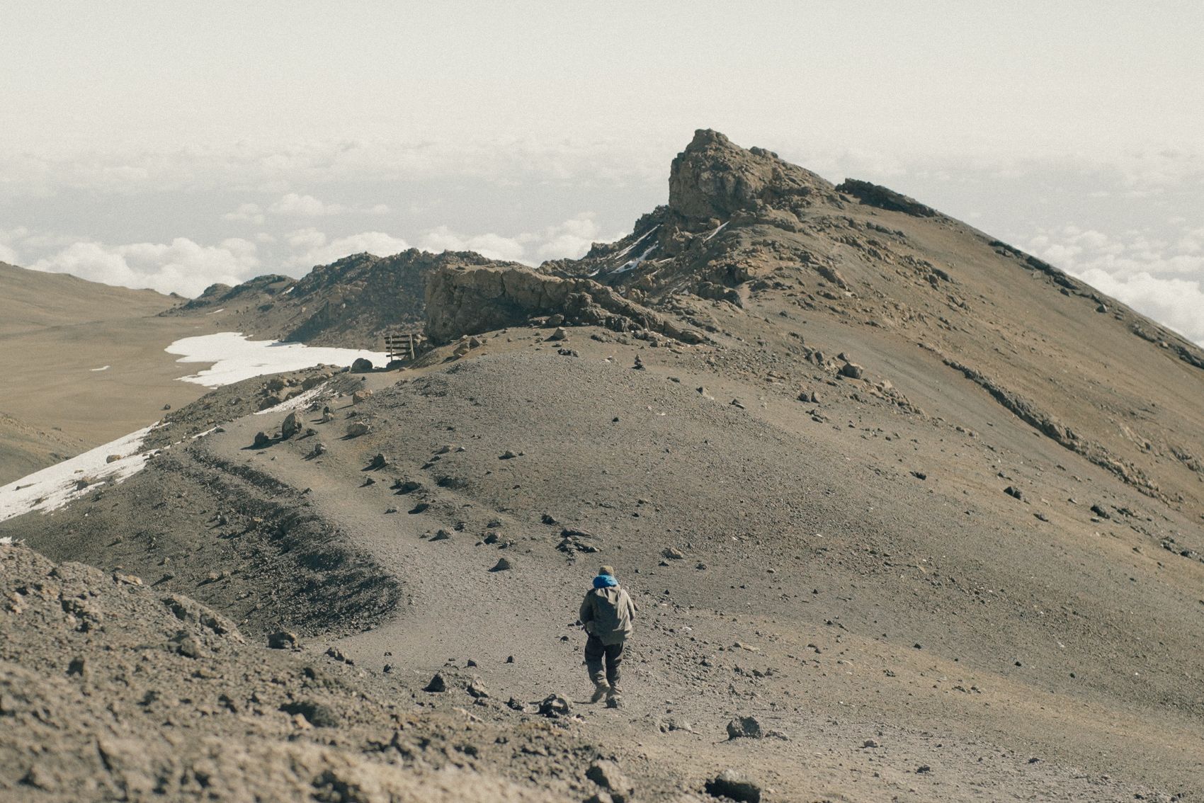 A person walking across Mt. Kilimanjaro in Tanzania