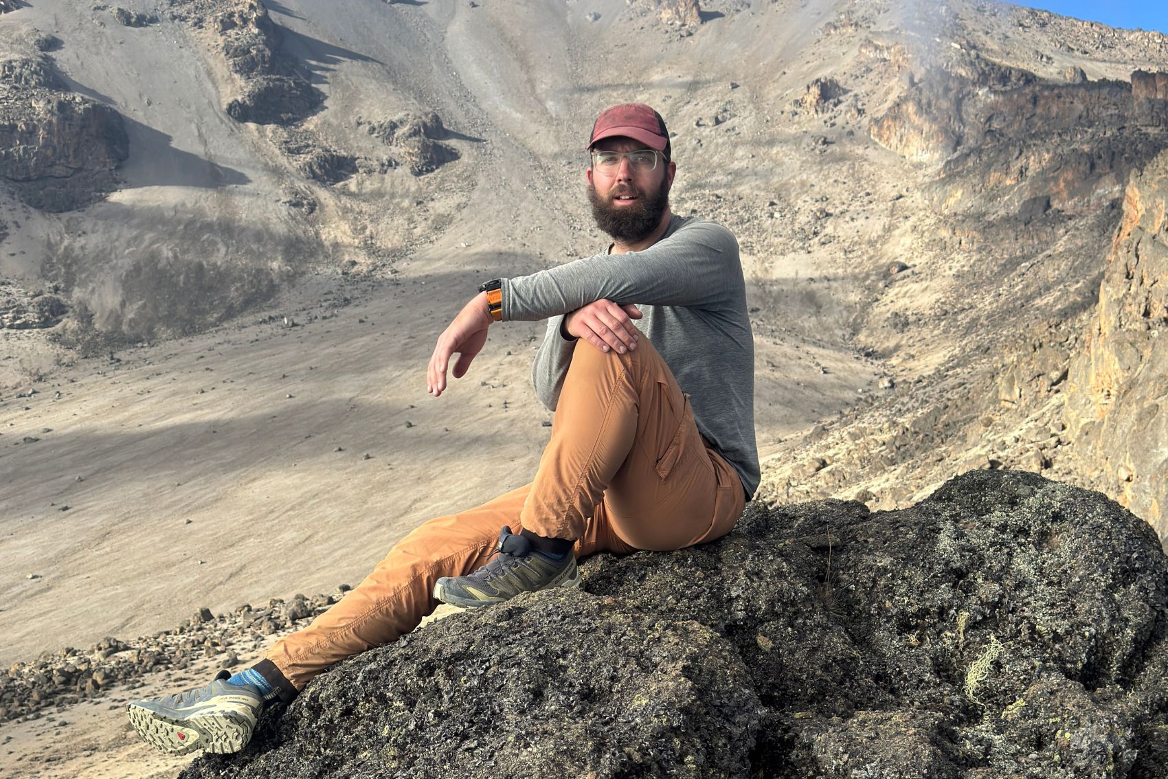 Mark Klassen posing for a photograph on Mt. Kilimanjaro in Tanzania