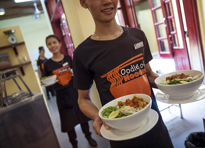 Spread oodles of support to at-risk youth serving up tasty noodles