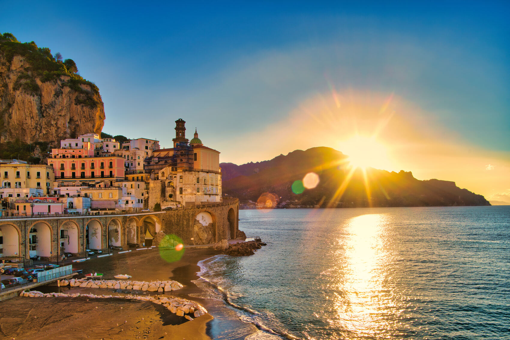 The sun setting in the tiny settlement of Atrani on Italy’s Amalfi Coast-ezypix