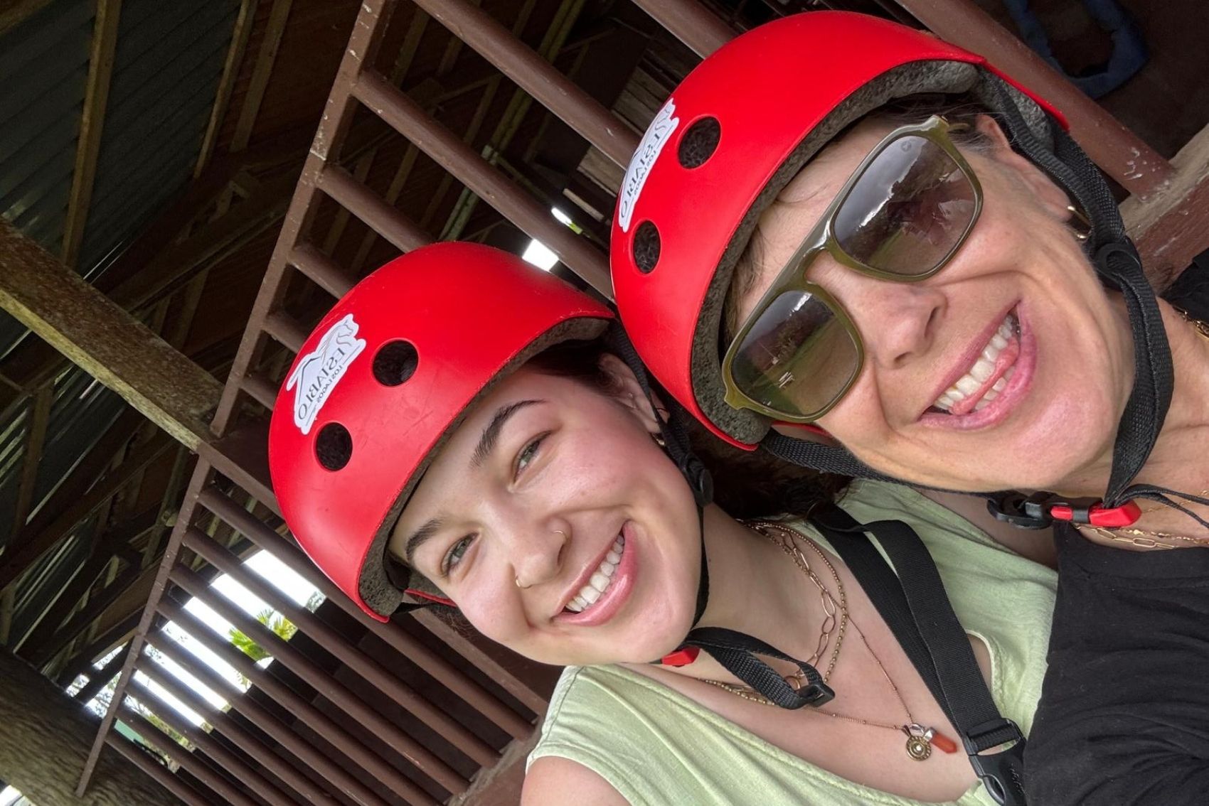 Debbie Bowman and her daughter Amanda posing for a photo before ziplining in Costa Rica