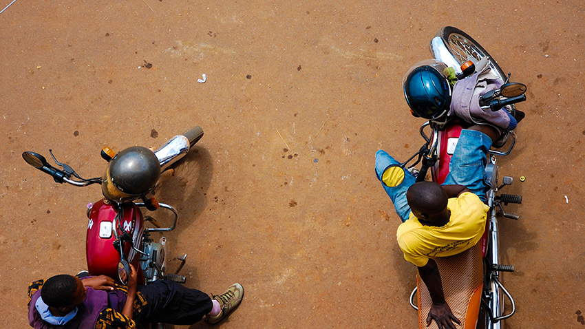 Most people use motorbike taxis, known as bodas. Photo courtesy Lauren P.