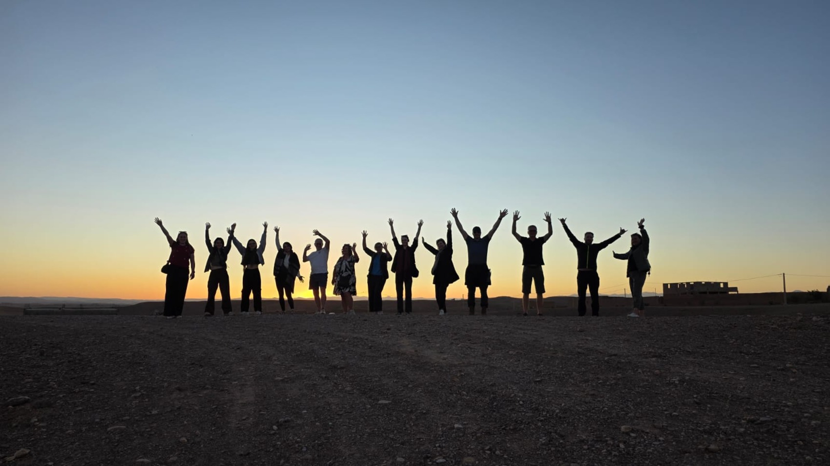 Christian Newberry, her boyfriend Colin and a G Adventures group in Morocco