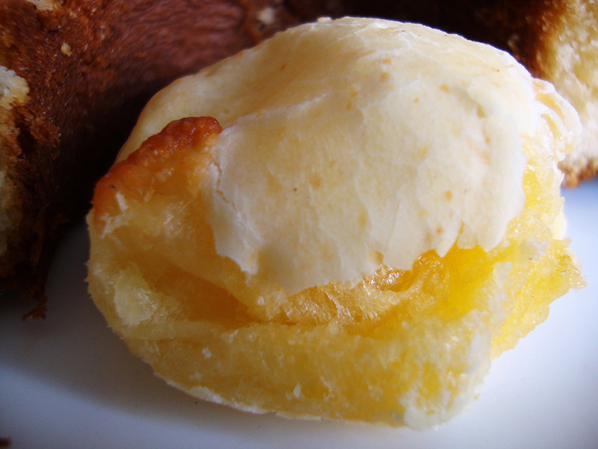 Brazilians eat homemade pao de queijo. Photo courtesy José A.