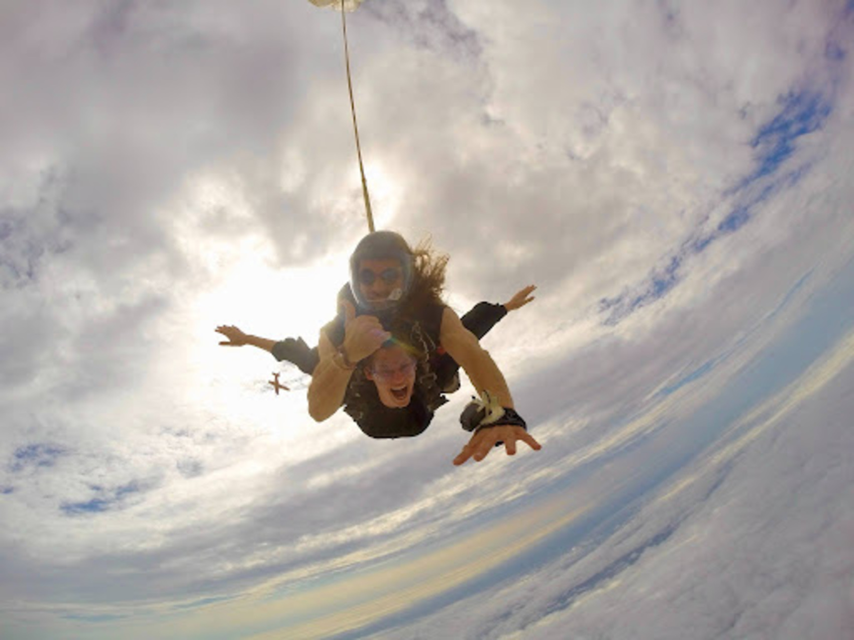 Swiss traveller Michelle Meyer skydiving with an instructor in Swakopmund, Namibia
