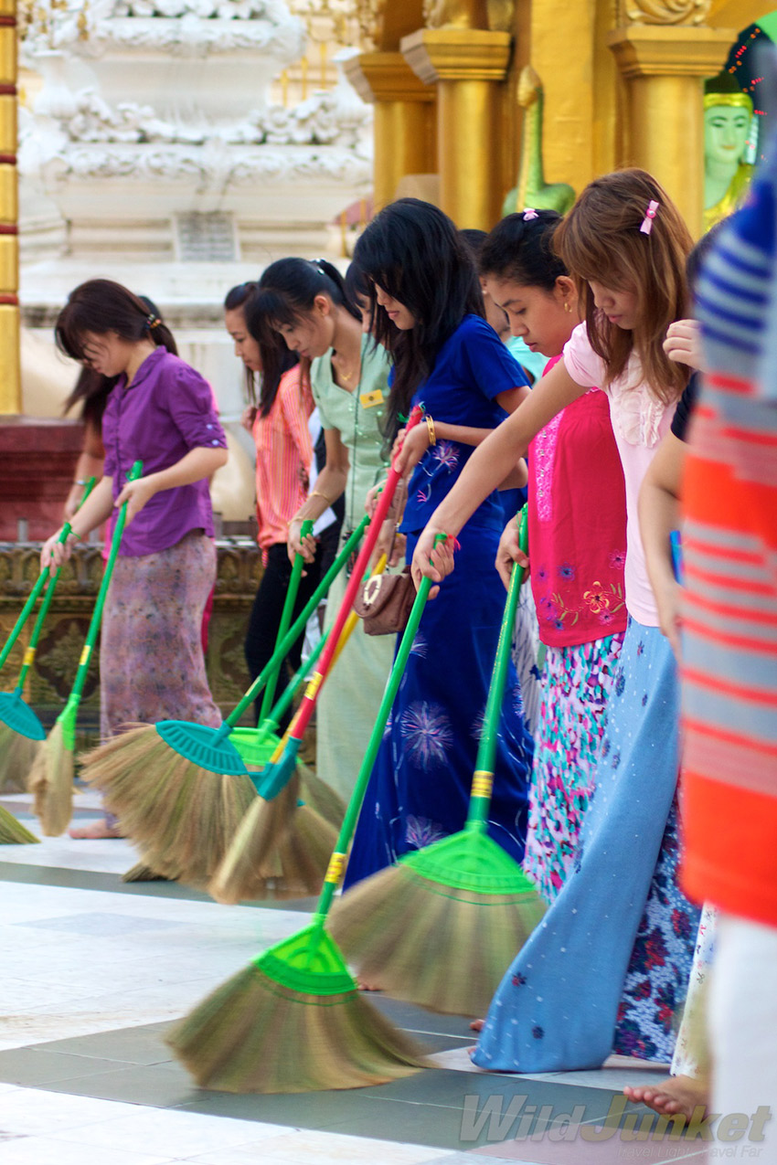 Ladies sweeping away their bad luck to welcome the new year.