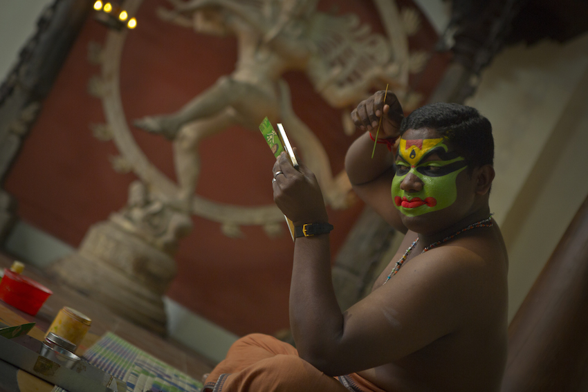 A Khatakali dancer prepares for the performance.