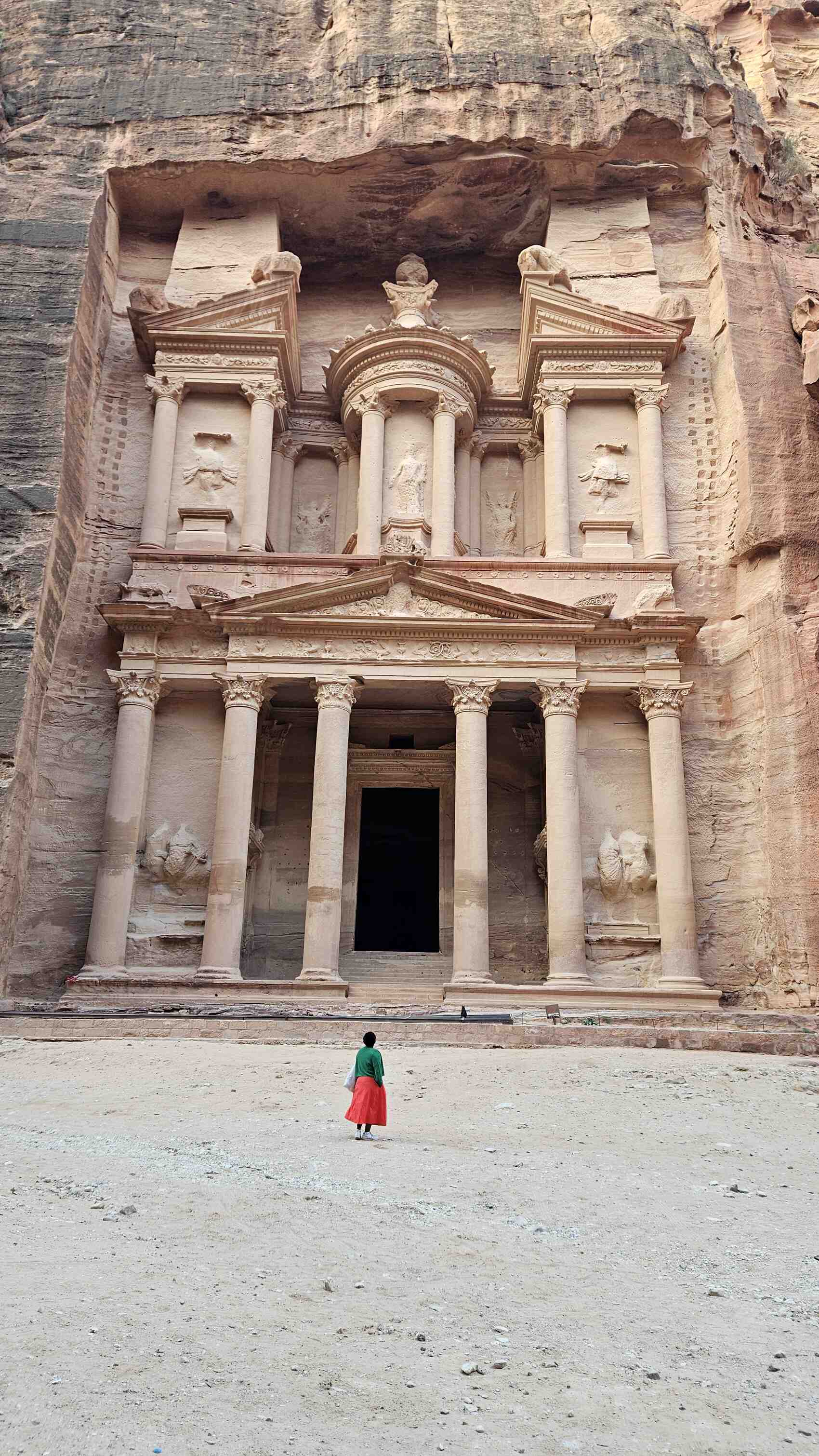 Ivy standing in front of the mighty Treasury at Petra