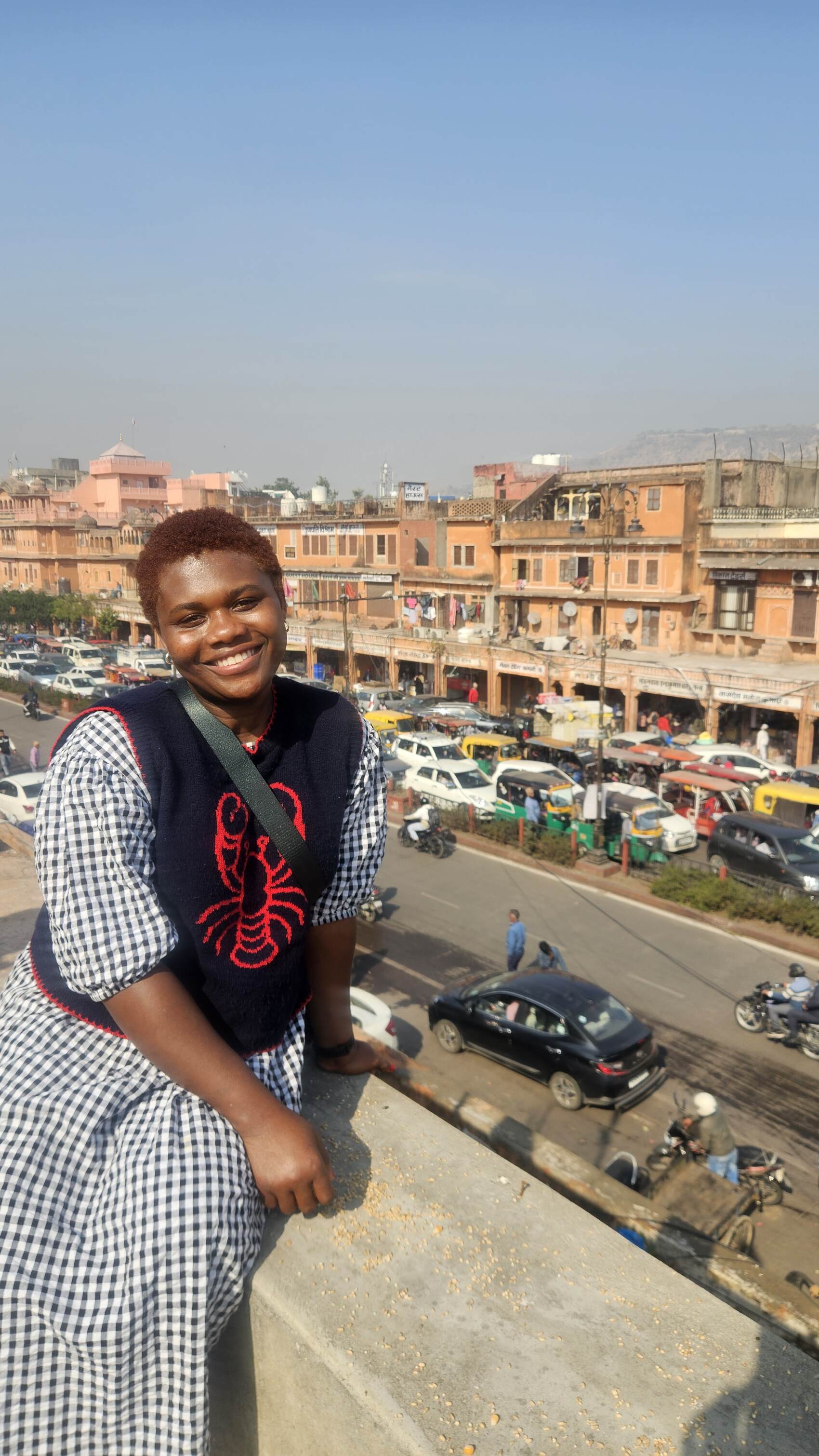 Ivy smiling in front of the Red Fort in Delhi, India
