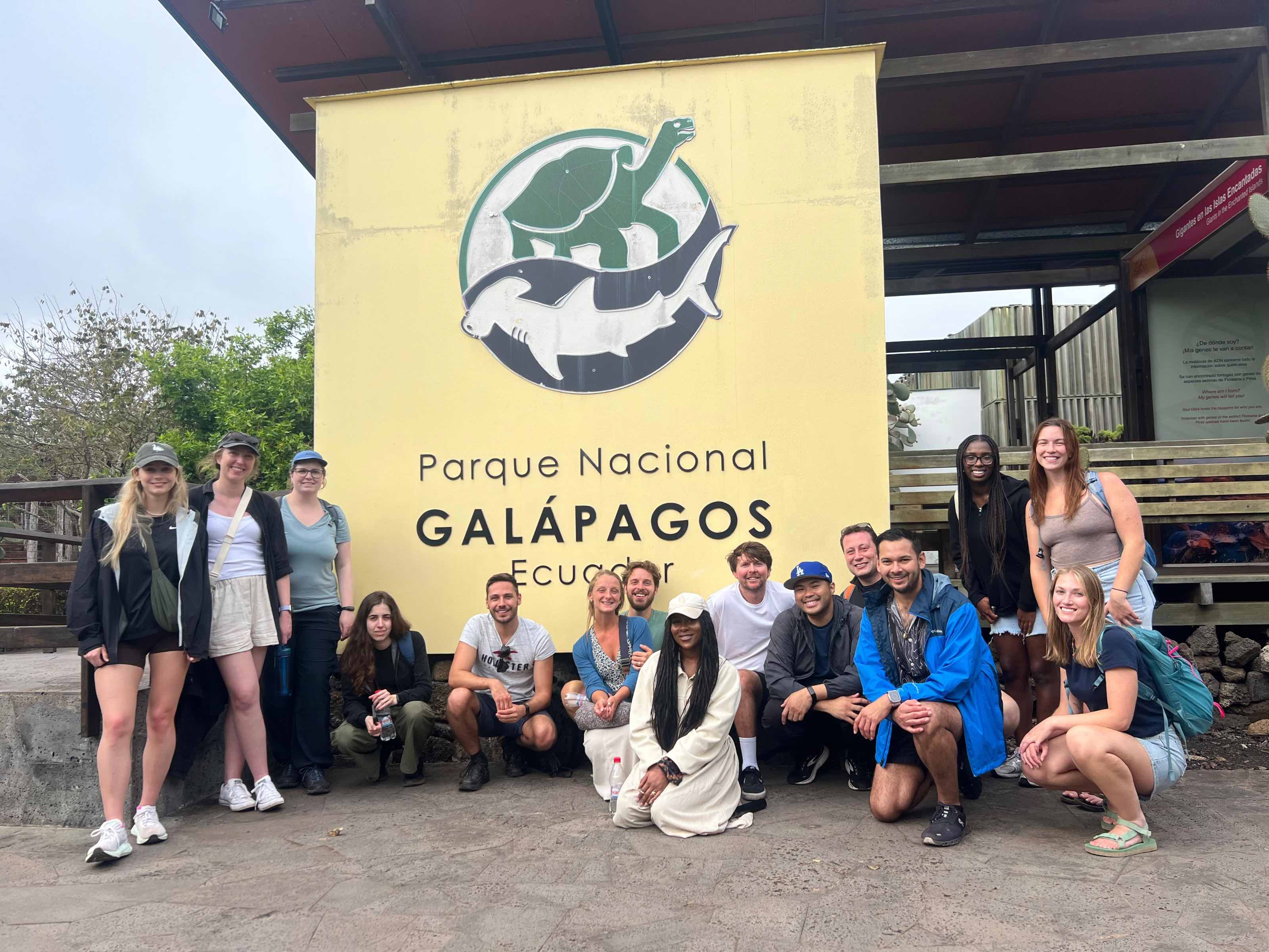 Group of travellers posing for a photo on a tour of the Gal&aacute;pagos