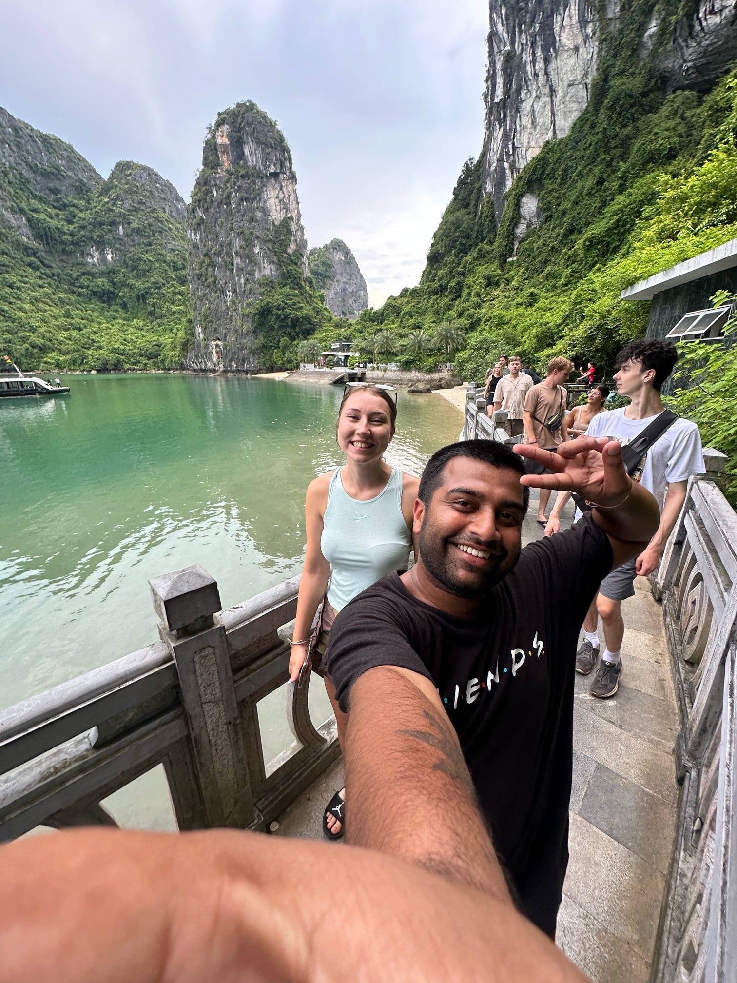 Traveller Ritesh posing for a photograph with fellow travellers in Southeast Asia